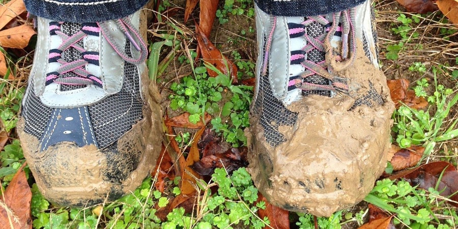 muddy wet leather boots